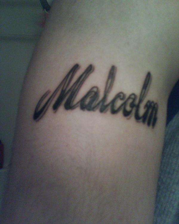 Who I Am, Malcolm tattoo
