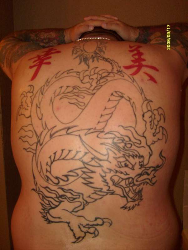 dragon back piece tattoo