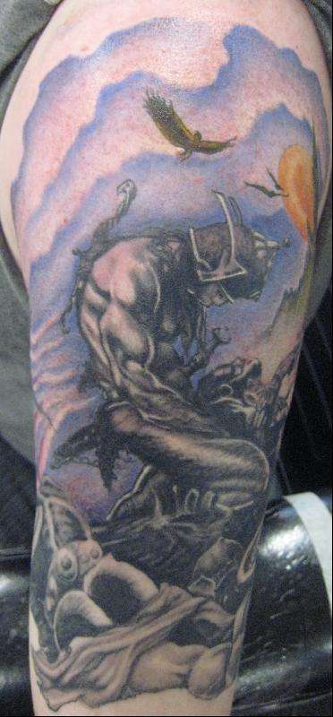 top of arm tattoo