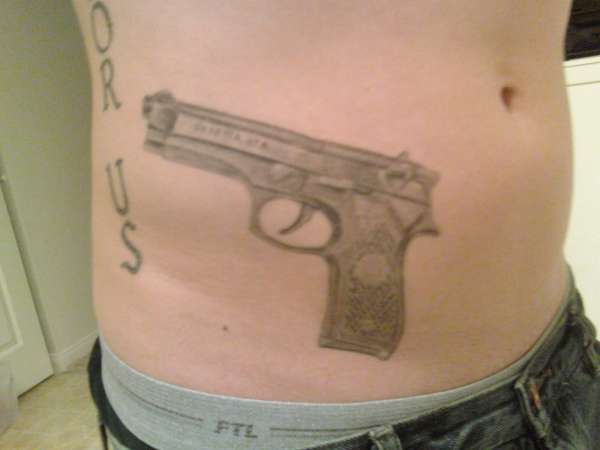 unfinished gun tattoo
