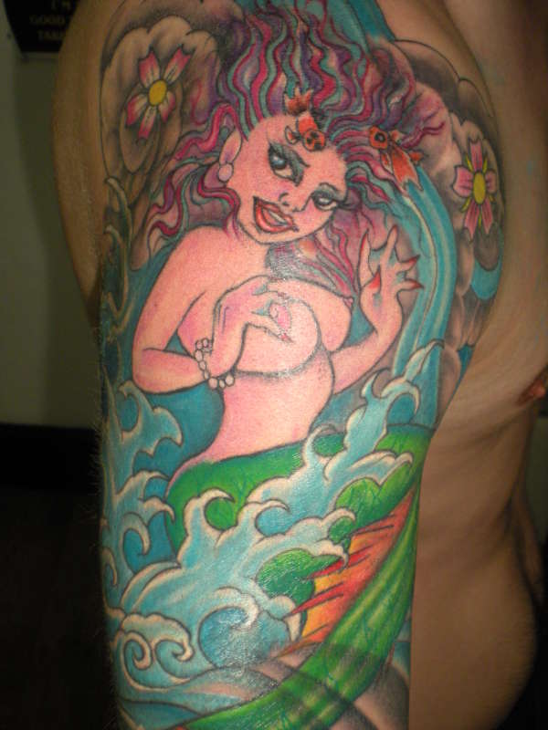 mermaid arm sleeve tattoo