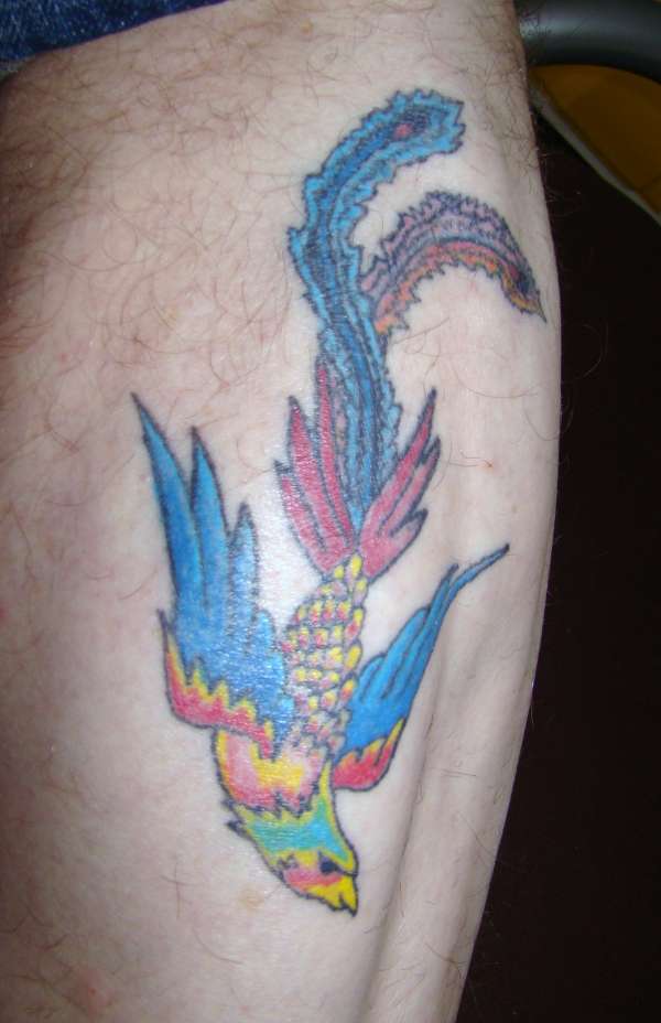 Phoenix on right leg. tattoo
