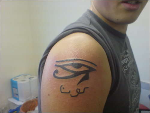 my first tattoo (eye of horus and my name in arabic) tattoo