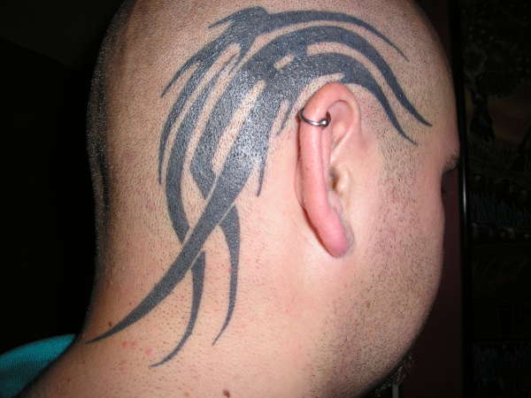 tribal head tattoo