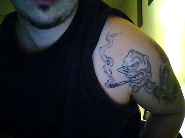 cartoon looking guy that i drew tattoo