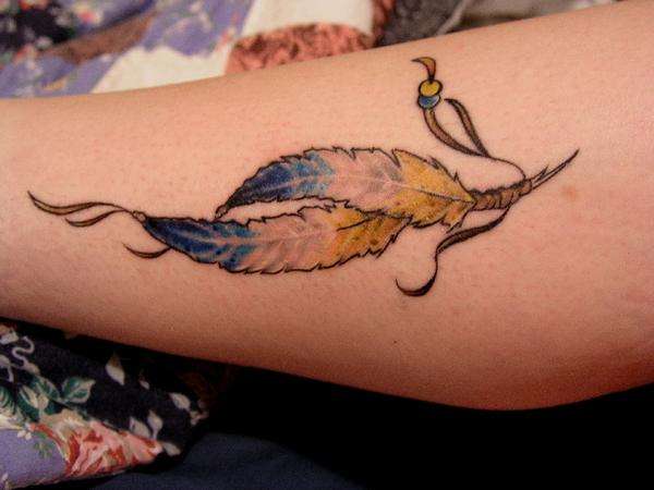 Feathers tattoo