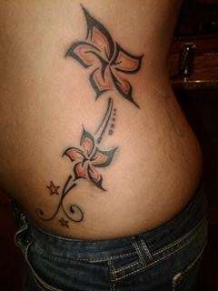Flower Tribal with Stars tattoo
