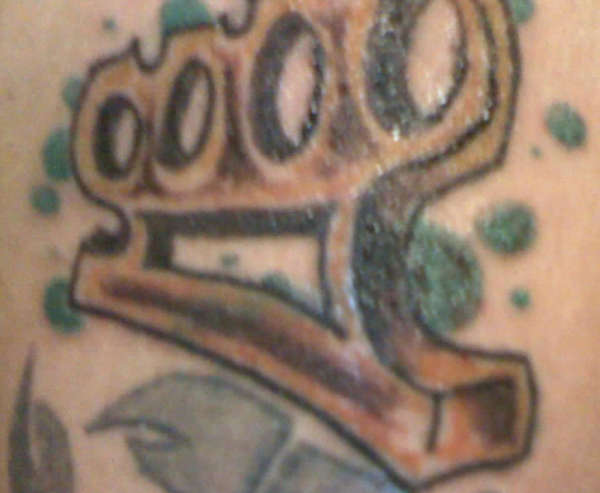 brass knuckles tattoo