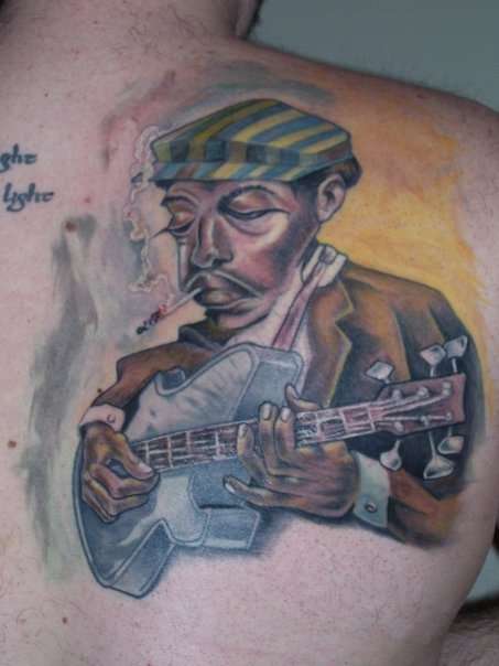 blues man tattoo