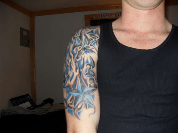 star with tribal tattoo