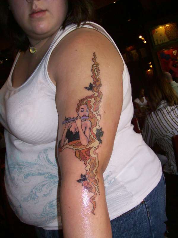 Flautist tattoo