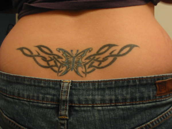 http://static.ratemyink.com/images/ul/755/Just-another-tramp-stamp-tattoo-75594.jpeg