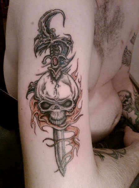 Skull with fire and water tattoo