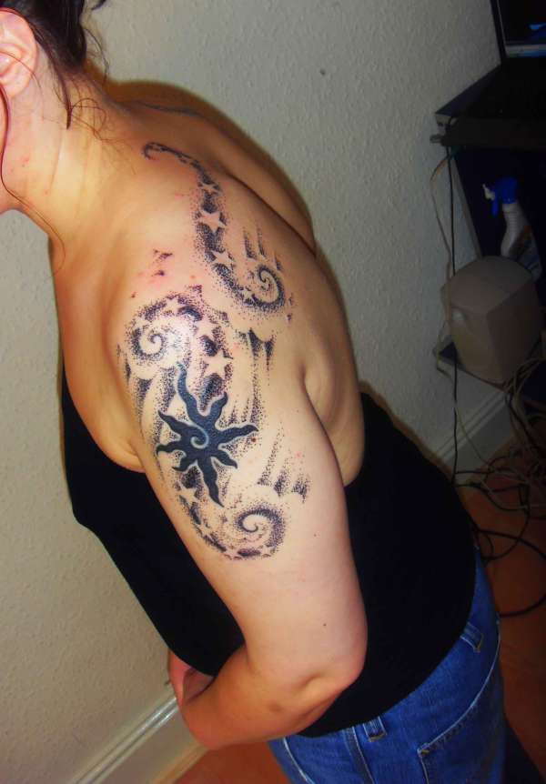 side view of cover-up with stars tattoo
