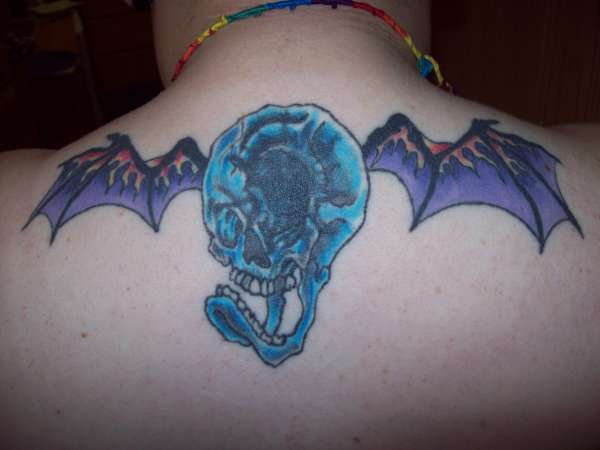 Skull with Bat Wings (not inspired by any band) tattoo