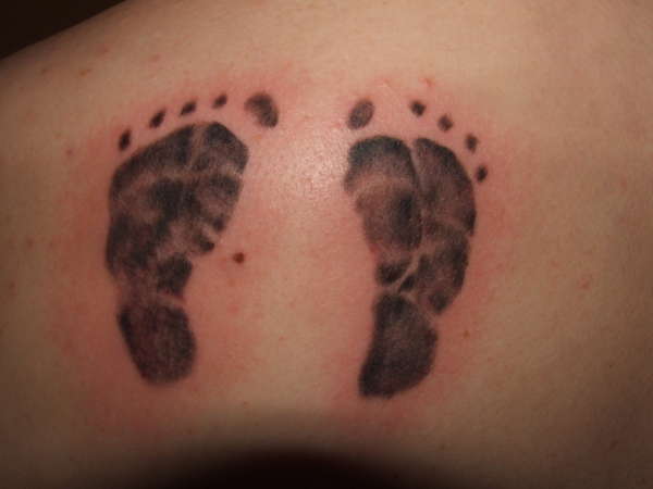 baby feet tattoo