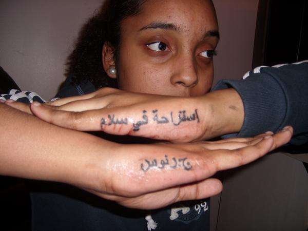 Arabic letters tattoo