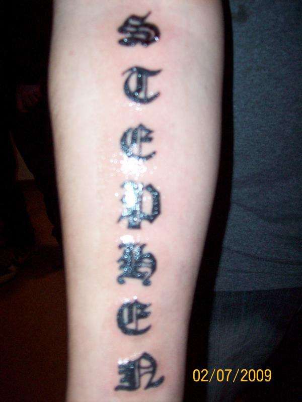 Old English Tat tattoo