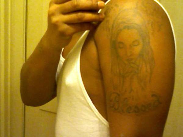 Virgin mary tattoo