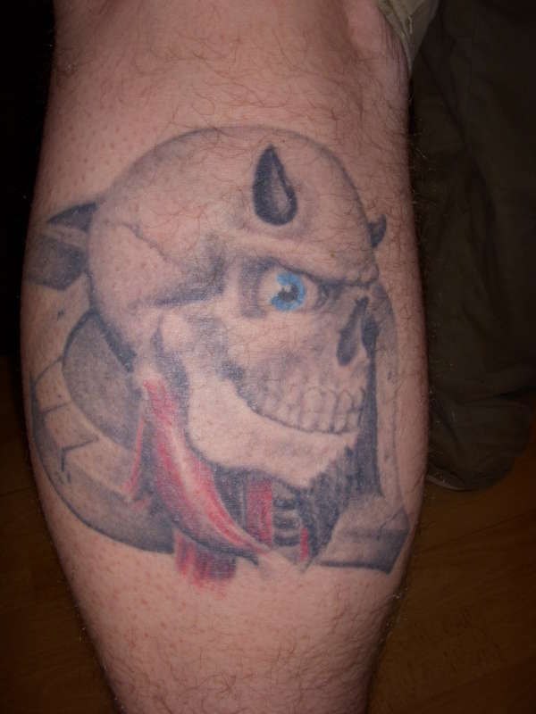 skull on a spade tattoo