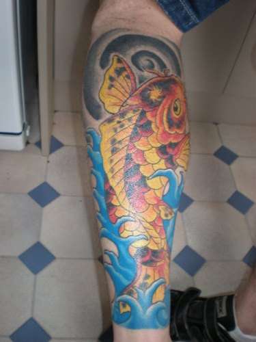 Koi left calf tattoo