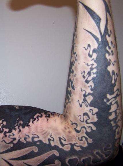 trippy tribal tattoo