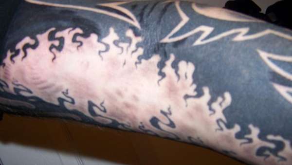 trippy tribal tattoo