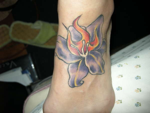 lily with fire tattoo