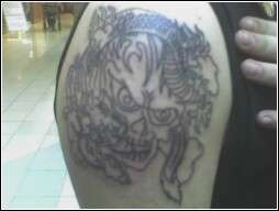 Skull / dragon tattoo