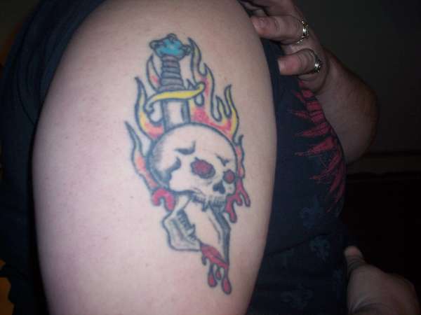 The dagger in the skull tattoo