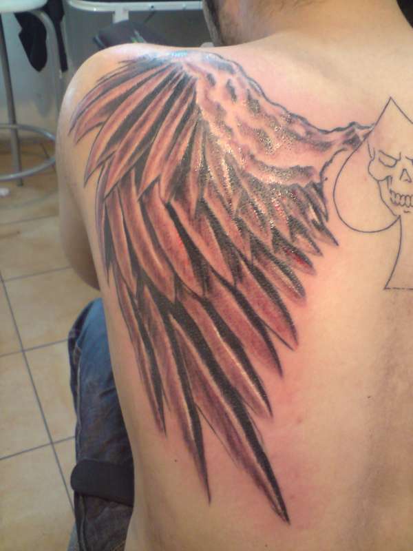 Wing tattoo