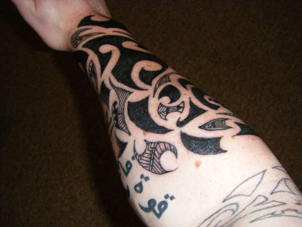 forearm part of maori sleeve, tattoo