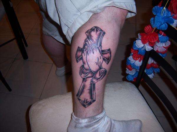 Cross With Praying Hands tattoo