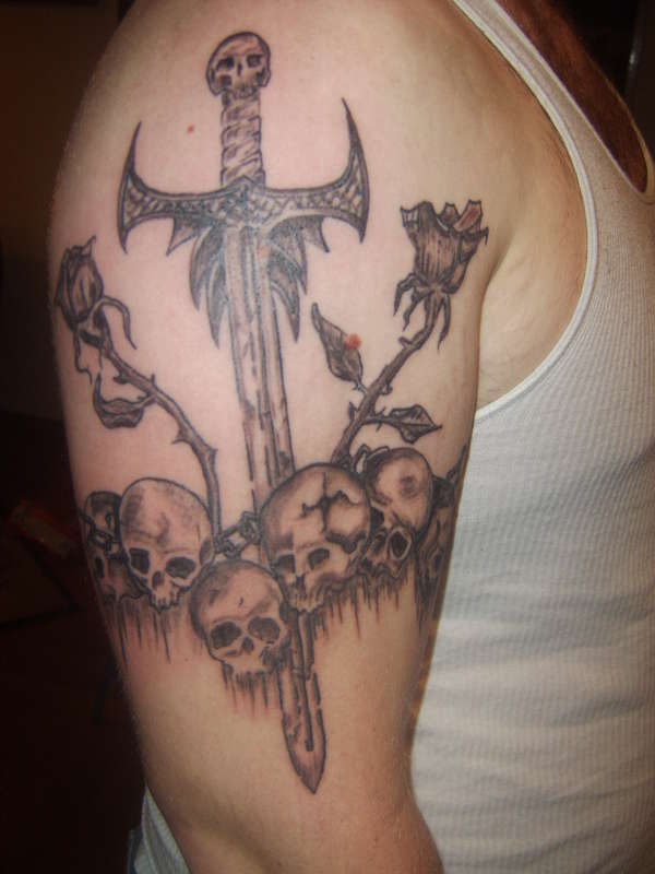 Sword and Skulls tattoo