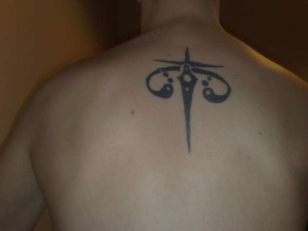 Tribak Back tattoo