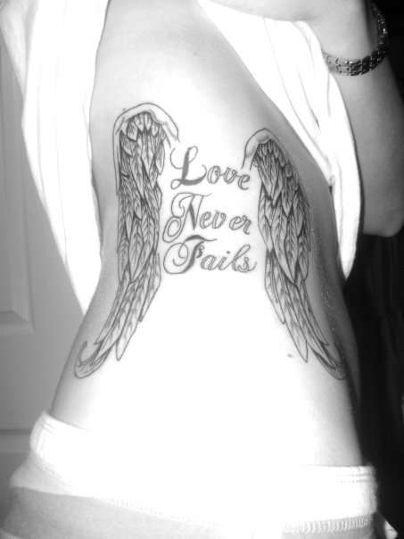 Love Never Fails tattoo