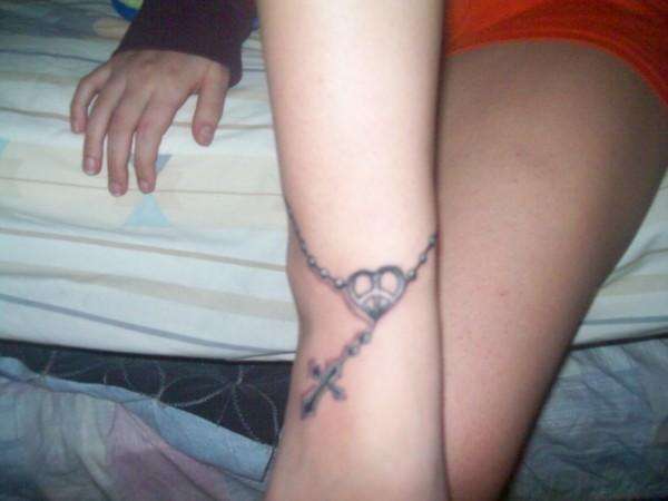 Peace Rosary tattoo