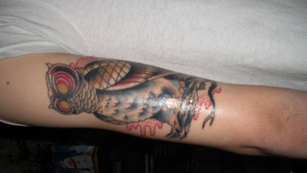 an owl tattoo