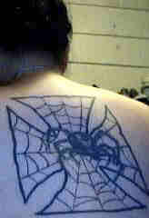 Black widow and iron cross spider web tattoo