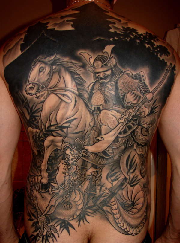 samurai fighting dragon tattoo
