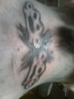 x and two brass tattoo