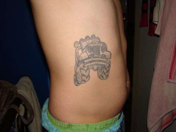 Jeep on ribs tattoo