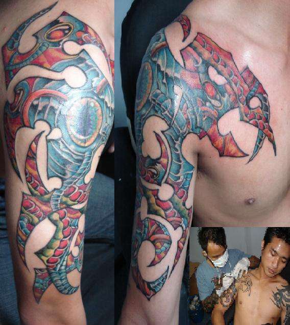 biomech in tribal tattoo