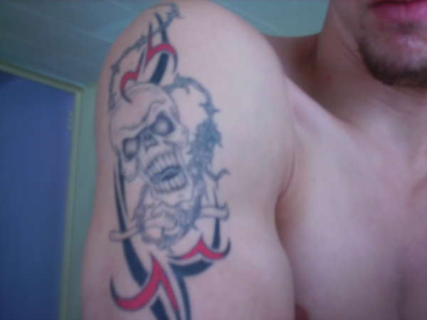 skull with tribal tattoo