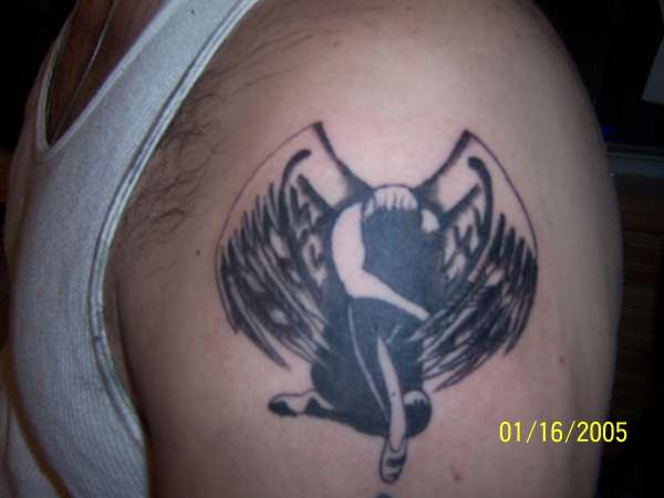 Sad angel tattoo