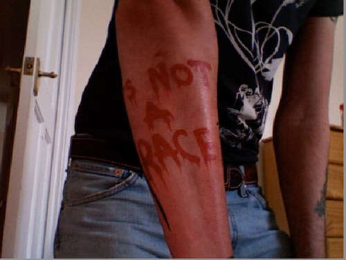 Flipped image so you can kinda see what it says now tattoo
