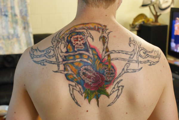 tribal reaper tattoo