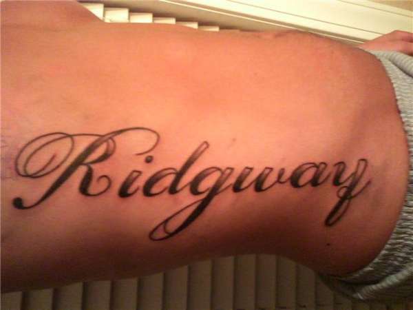 Last Name-side piece tattoo