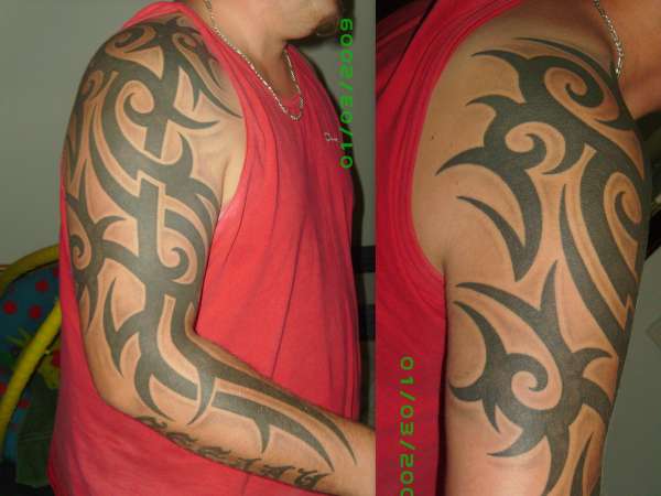 tribal arm sleeve tattoo