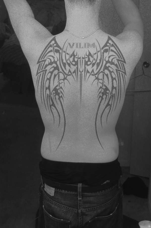 tribal back tattoo